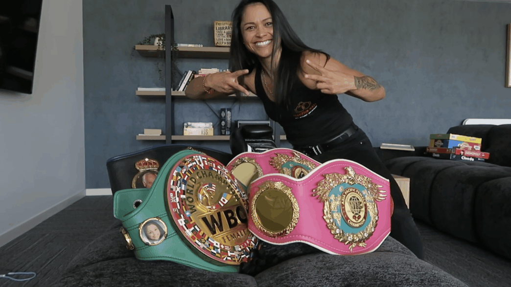 Gang Gang Lulu poses with her world boxing championship awards in Perth, Western Australia.