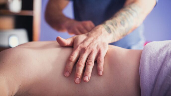 Stephanie-Allen-photo-of-male-being -massage by-another-male.